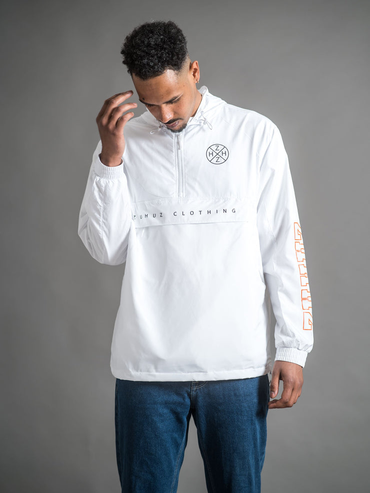 basic pull over jacket in white with zuhuz print and zuhuz logo print in black and orange